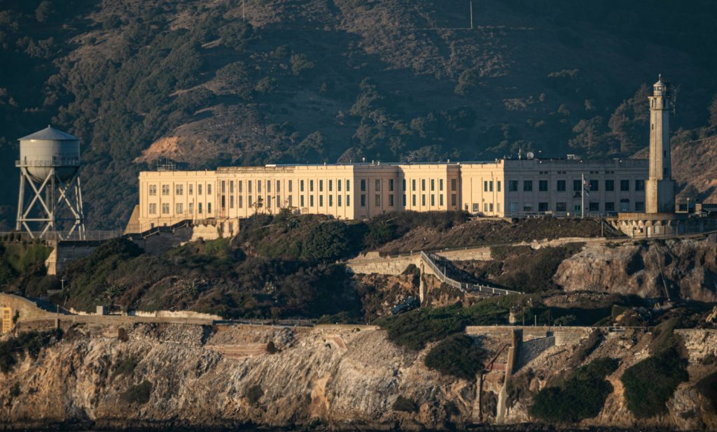 A view of Alcatraz Island, featuring the historic prison and lighthouse in San Francisco Bay.