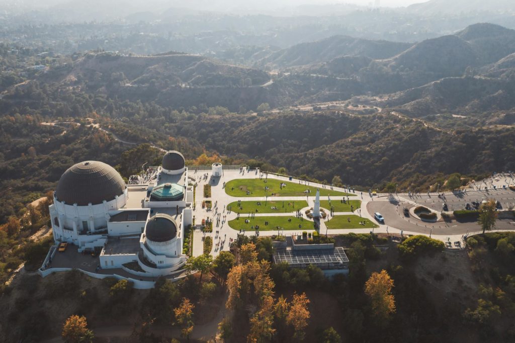 Stunning aerial shot of Griffith Observatory and surrounding landscape in Los Angeles.