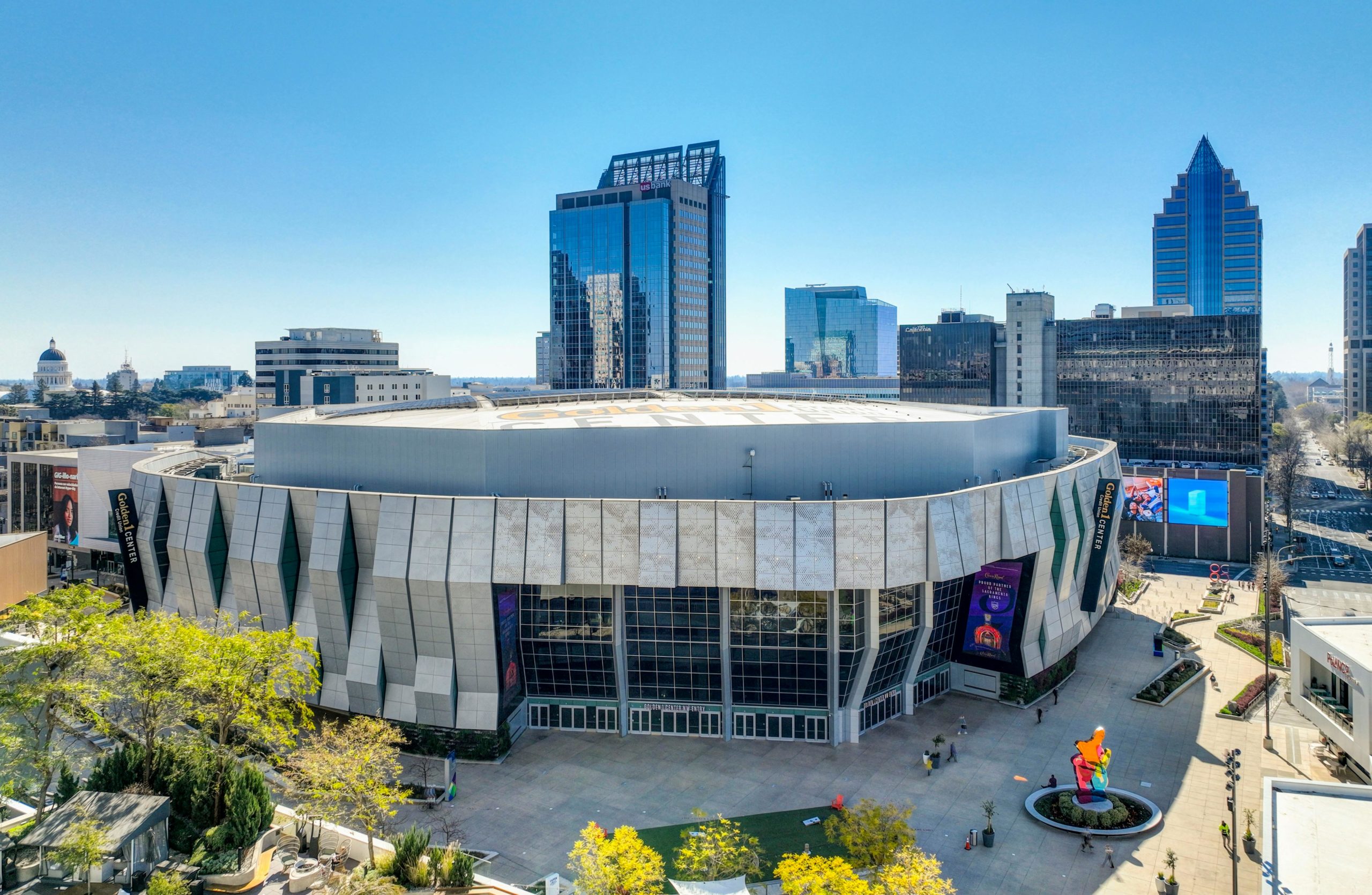 Aerial view of modern architecture featuring the Golden 1 Center in Sacramento's vibrant downtown.
